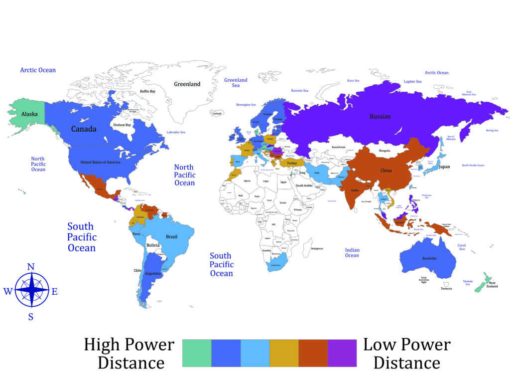 A world map is color-coded by high to low power distance:High power distance: Malaysia, Guatemala, Philippines, Arab nations — hierarchical societies with centralized authority. Low power distance: Denmark, Sweden, New Zealand — egalitarian societies valuing participative decision-making. Medium-shade countries have moderate acceptance of hierarchy.
