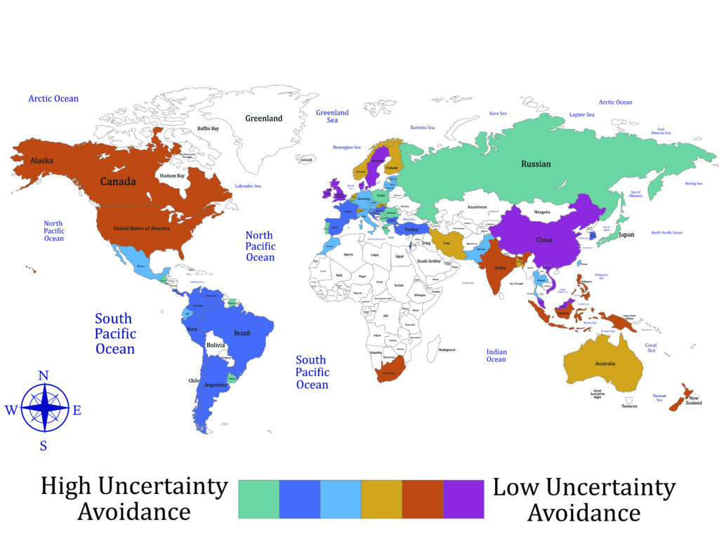 A world map shaded by uncertainty avoidance levels:High uncertainty avoidance: Greece, Japan, France — cultures preferring rules, stability, and structured situations. Low uncertainty avoidance: Singapore, Denmark, Jamaica — cultures comfortable with ambiguity and risk. Intermediate shades indicate moderate tolerance for uncertainty.